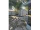Backyard view features a storage shed, offering practical outdoor storage options at 435 N Observatory Dr, Orlando, FL 32835
