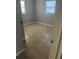 Bright bedroom featuring tile floors and fresh paint at 435 N Observatory Dr, Orlando, FL 32835
