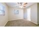 Bedroom featuring a window for natural light and neutral carpeting at 4748 Amoy Ct, Orlando, FL 32811
