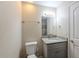 The bathroom features a grey granite vanity at 4805 Okeefe St, Orlando, FL 32808