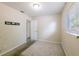 The bedroom includes carpet floors, a window with blinds, and a bracket installed on the wall at 4805 Okeefe St, Orlando, FL 32808