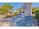 Two-story home with a concrete driveway and simple landscaping, perfect for a starter home at 4805 Okeefe St, Orlando, FL 32808