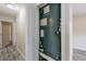 The hallway leads to rooms with wood style floors at 4805 Okeefe St, Orlando, FL 32808