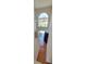 Entryway with tile flooring featuring a large window above the open front door at 502 Eagle Ct, Kissimmee, FL 34759