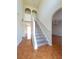 Bright foyer featuring tile flooring, staircase, and arched doorways at 502 Eagle Ct, Kissimmee, FL 34759