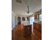Bright kitchen with an island, wooden cabinets, and tile flooring at 502 Eagle Ct, Kissimmee, FL 34759