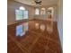 Open-concept living room showcasing decorative tile floors and arched windows at 502 Eagle Ct, Kissimmee, FL 34759
