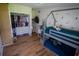 Playful bunk bed room with closet and cheerful woodland wall decals, a cozy retreat at 5384 Barton Dr, Orlando, FL 32807