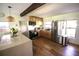 Kitchen with stainless steel appliances, granite countertops, and wood floors at 5384 Barton Dr, Orlando, FL 32807