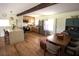 Bright kitchen featuring modern stainless appliances and wood cabinetry at 5384 Barton Dr, Orlando, FL 32807