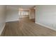 Bright and spacious living room with sleek flooring and neutral walls at 5500 Riviera Dr, Orlando, FL 32808