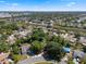 An aerial view shows the property nestled among mature trees and nearby community amenities at 5709 Breskin Dr, Orlando, FL 32839