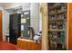 Basement featuring a refrigerator, furnace, storage shelves, and red concrete floors at 5709 Breskin Dr, Orlando, FL 32839