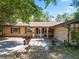 The front exterior of the home includes a covered entrance and an attached garage at 5709 Breskin Dr, Orlando, FL 32839