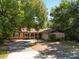A charming single-story home with a well-maintained lawn and mature trees at 5709 Breskin Dr, Orlando, FL 32839