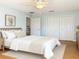 This bright bedroom has a ceiling fan and closet at 602 Milan Dr, Kissimmee, FL 34758