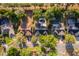 An aerial view of homes, showcasing backyard pools, mature trees, and residential neighborhood at 659 N Endeavour Dr, Winter Springs, FL 32708