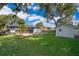Beautiful backyard featuring a pool, lanai, and a storage shed at 659 N Endeavour Dr, Winter Springs, FL 32708