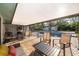 Spacious covered patio with table seating and a pool view at 659 N Endeavour Dr, Winter Springs, FL 32708