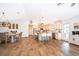 Bright, open-concept kitchen with modern appliances, a large island, and seamless flow to the dining area at 659 N Endeavour Dr, Winter Springs, FL 32708