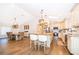 An open concept kitchen with an island, wood countertops, stainless appliances and adjacent dining area at 659 N Endeavour Dr, Winter Springs, FL 32708