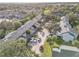 Aerial view of a well-maintained community with lush landscaping and ample parking at 7484 Canford Ct # 8, Winter Park, FL 32792
