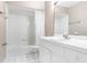 Bathroom featuring a shower/tub combo, white vanity, and tiled flooring at 7484 Canford Ct # 8, Winter Park, FL 32792