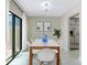A delightful dining room with stainless steel appliances, modern art, and bright light at 7484 Canford Ct # 8, Winter Park, FL 32792