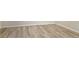 New light wood flooring with white trim and neutral wall paint throughout at 7484 Canford Ct # 8, Winter Park, FL 32792