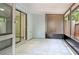 Inviting sun room with tile flooring, and plenty of sunlight at 7484 Canford Ct # 8, Winter Park, FL 32792