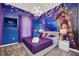 Charming bedroom featuring 'Tangled' themed decor, creating a magical and whimsical atmosphere at 7587 Sunflower Cir, Kissimmee, FL 34747
