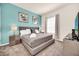 Comfortable bedroom with a serene ambiance, featuring stylish furnishings and decor at 7587 Sunflower Cir, Kissimmee, FL 34747