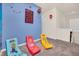 A unique room with gaming decor, themed chairs, and a playful design, perfect for a game room at 7587 Sunflower Cir, Kissimmee, FL 34747