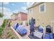 Private outdoor patio with stylish lounge seating and dining area for relaxation at 7587 Sunflower Cir, Kissimmee, FL 34747
