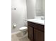 Bathroom with a modern vanity, granite countertop, a standard toilet, and a tile floor at 7675 Fordson Ln, Windermere, FL 34786