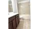 Bathroom with a vanity and shower/tub combo at 7675 Fordson Ln, Windermere, FL 34786