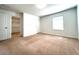 Bedroom with a walk in closet and window at 7675 Fordson Ln, Windermere, FL 34786