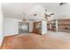 Bright living room with fireplace, carpeting, and sliding doors at 770 Manor Dr, Bartow, FL 33830