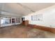 Covered patio featuring concrete floors, neutral paint and sliding glass windows at 770 Manor Dr, Bartow, FL 33830