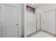 Spacious bathroom with a glass door shower and tile floors at 902 Grand Hilltop Dr, Apopka, FL 32703
