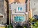 Birds eye view of private rooftop deck, screened pool, and exterior of the home at 910 Alameda St, Orlando, FL 32804