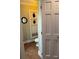 Powder room featuring tile flooring, stylish decorations, and a convenient location at 910 Alameda St, Orlando, FL 32804