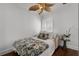 Bright bedroom featuring a leaf ceiling fan and a full size bed at 910 Alameda St, Orlando, FL 32804