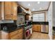Well-equipped kitchen with stainless steel appliances and granite countertops at 910 Alameda St, Orlando, FL 32804