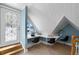 Cozy home office with custom built in desk, statement window and tongue and groove vaulted ceilings at 910 Alameda St, Orlando, FL 32804