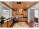Home office with custom built-in cabinetry and wood floors at 910 Alameda St, Orlando, FL 32804