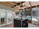 Cozy screened-in patio with dining area, perfect for enjoying outdoor meals with a view of the pool at 910 Alameda St, Orlando, FL 32804