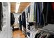 Walk-in closet with built in storage and clothing racks at 910 Alameda St, Orlando, FL 32804