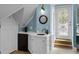 Wet bar featuring sink, mini fridge, and countertop space for entertaining at 910 Alameda St, Orlando, FL 32804
