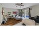 Comfortable living room with sliding glass doors and hardwood floors at 2652 Laser Ct, Orlando, FL 32826